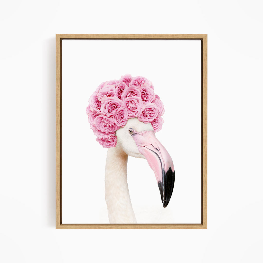 A flamingo with a pink flower crown on its head.