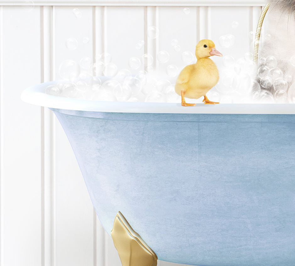 a rubber duck in a bathtub filled with bubbles