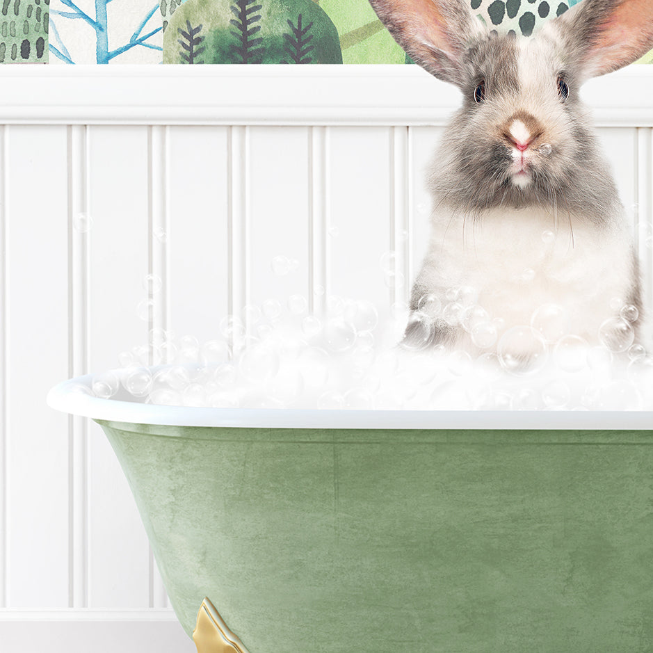 a rabbit is sitting in a bathtub full of bubbles