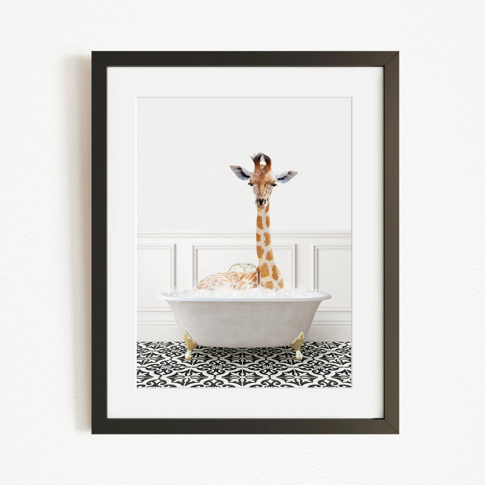 A giraffe is sitting in a white bathtub filled with bubbles, creating a whimsical and playful scene.