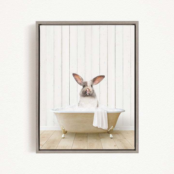 A white rabbit sitting in a bathtub filled with water, with its head poking out of the tub.