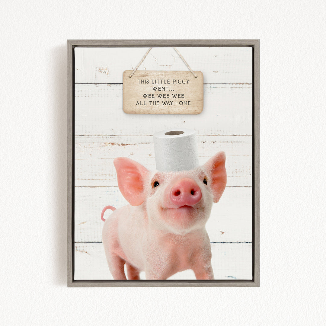 A cute piglet standing on a white wooden background, with a sign above it that reads "This little piggy went wee wee wee all the way home".
