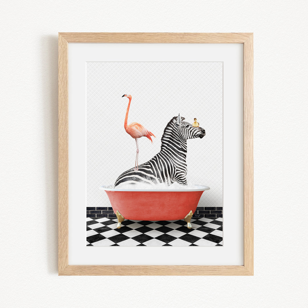 A framed image depicting a zebra sitting in a red bathtub, with a flamingo standing on its back and a bird perched on its head.