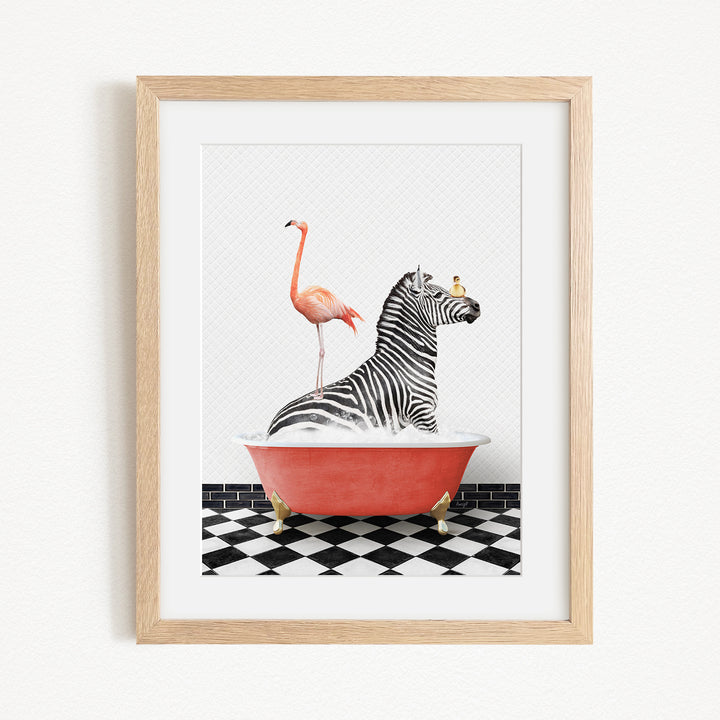 A framed image depicting a zebra sitting in a red bathtub, with a flamingo standing on its back and a bird perched on its head.