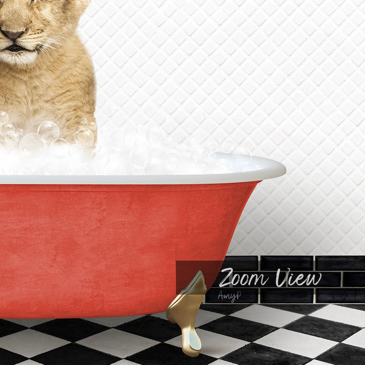 A cat is sitting in a red bathtub filled with bubbles, with a black and white checkered floor and a tile wall in the background.