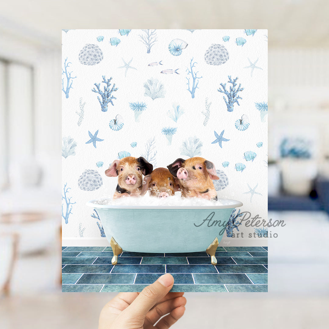 a person holding up a card with two small animals in a bathtub