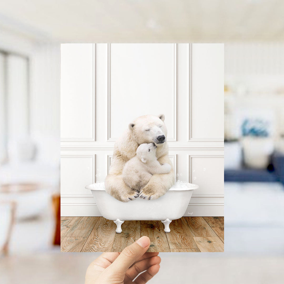 A polar bear cub is sitting in a bathtub, being held by an adult polar bear.