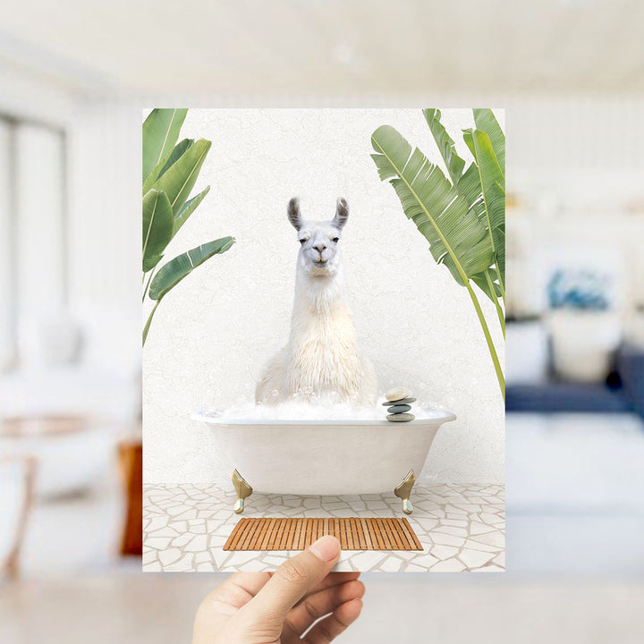 A white llama sitting in a white bathtub filled with bubbles, surrounded by green leaves, in a room with a tiled floor.