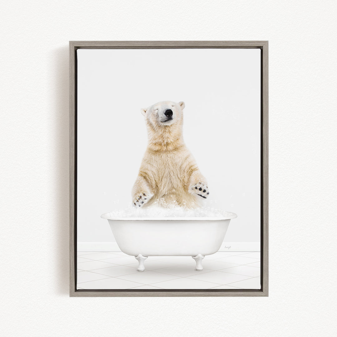 A polar bear standing in a white bathtub filled with water, appearing to be enjoying a bath.