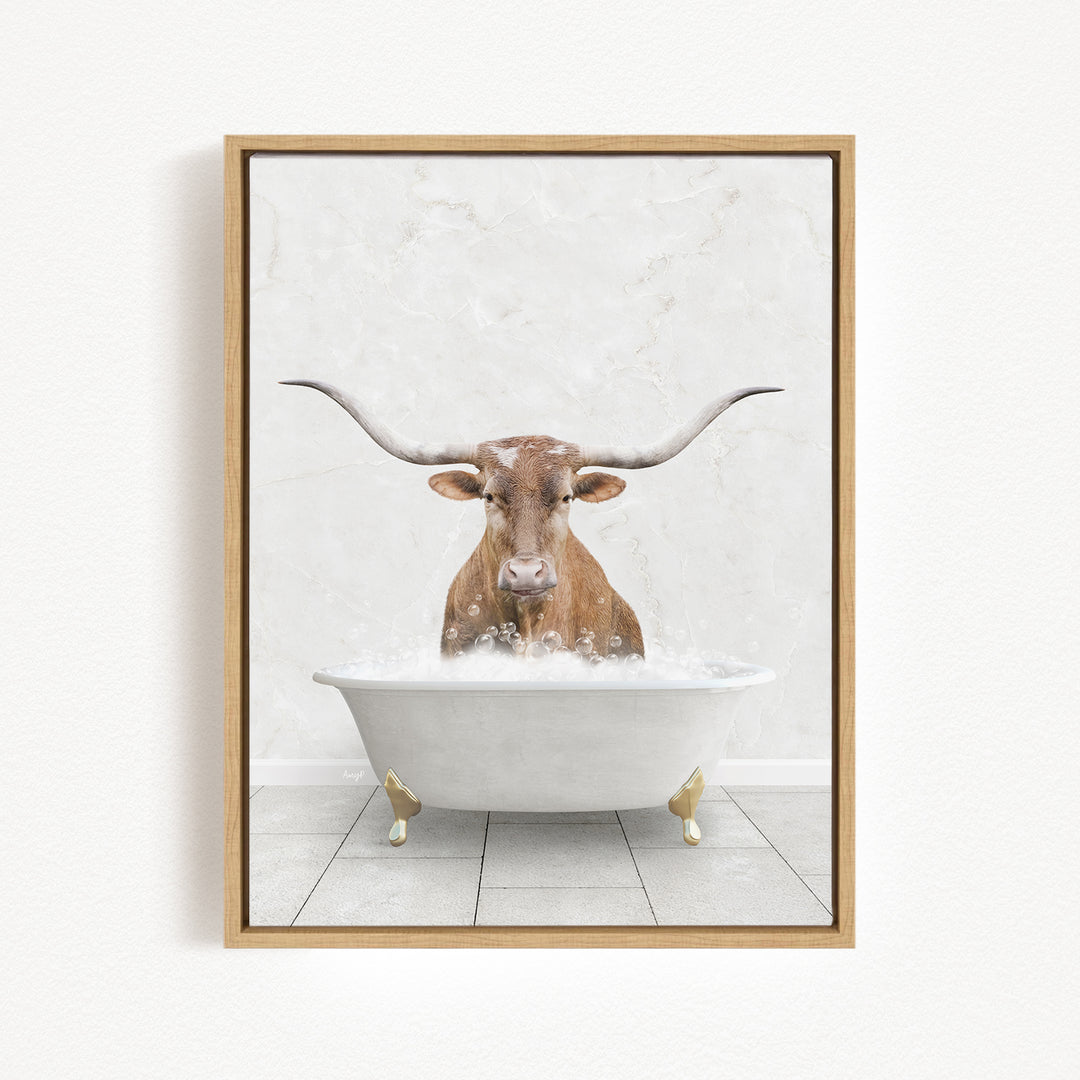 A brown cow with long horns is sitting in a white bathtub filled with water, creating a whimsical and humorous scene.