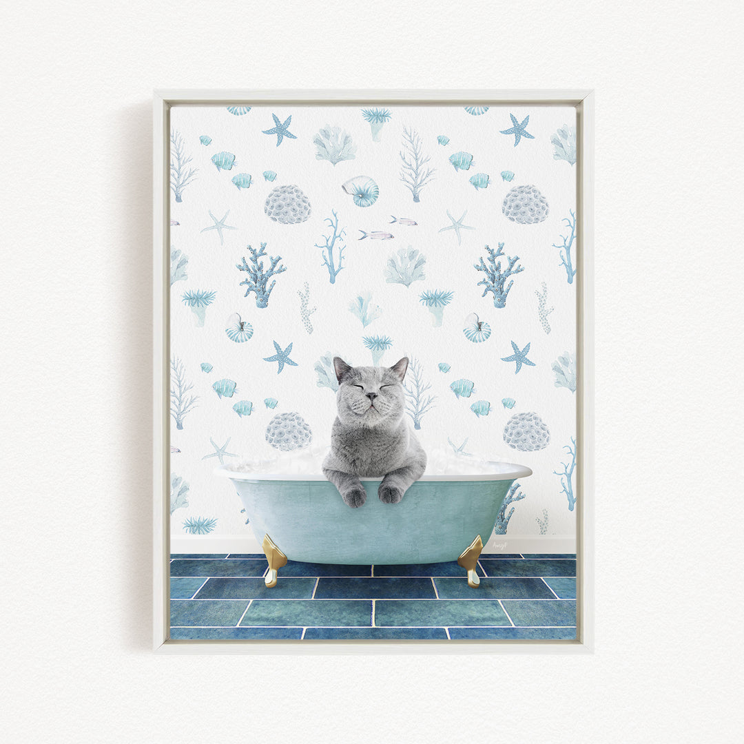 A gray cat sitting in a blue bathtub, surrounded by a pattern of seashells, starfish, and other marine life.