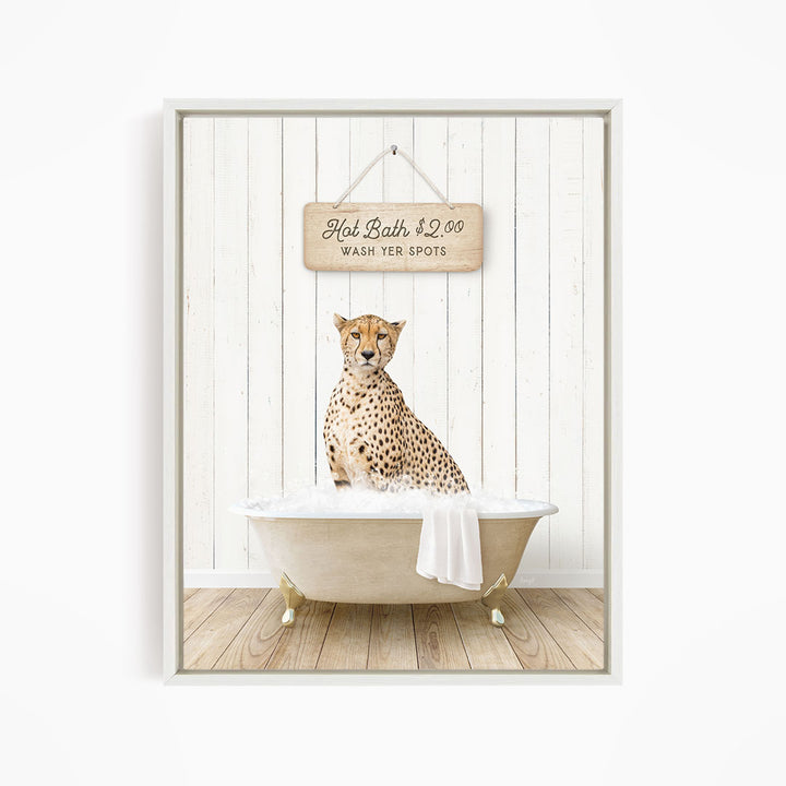 A cheetah sitting in a bathtub, with a sign above it that reads "Hot Bath $2.00 WASH YER SPOTS".