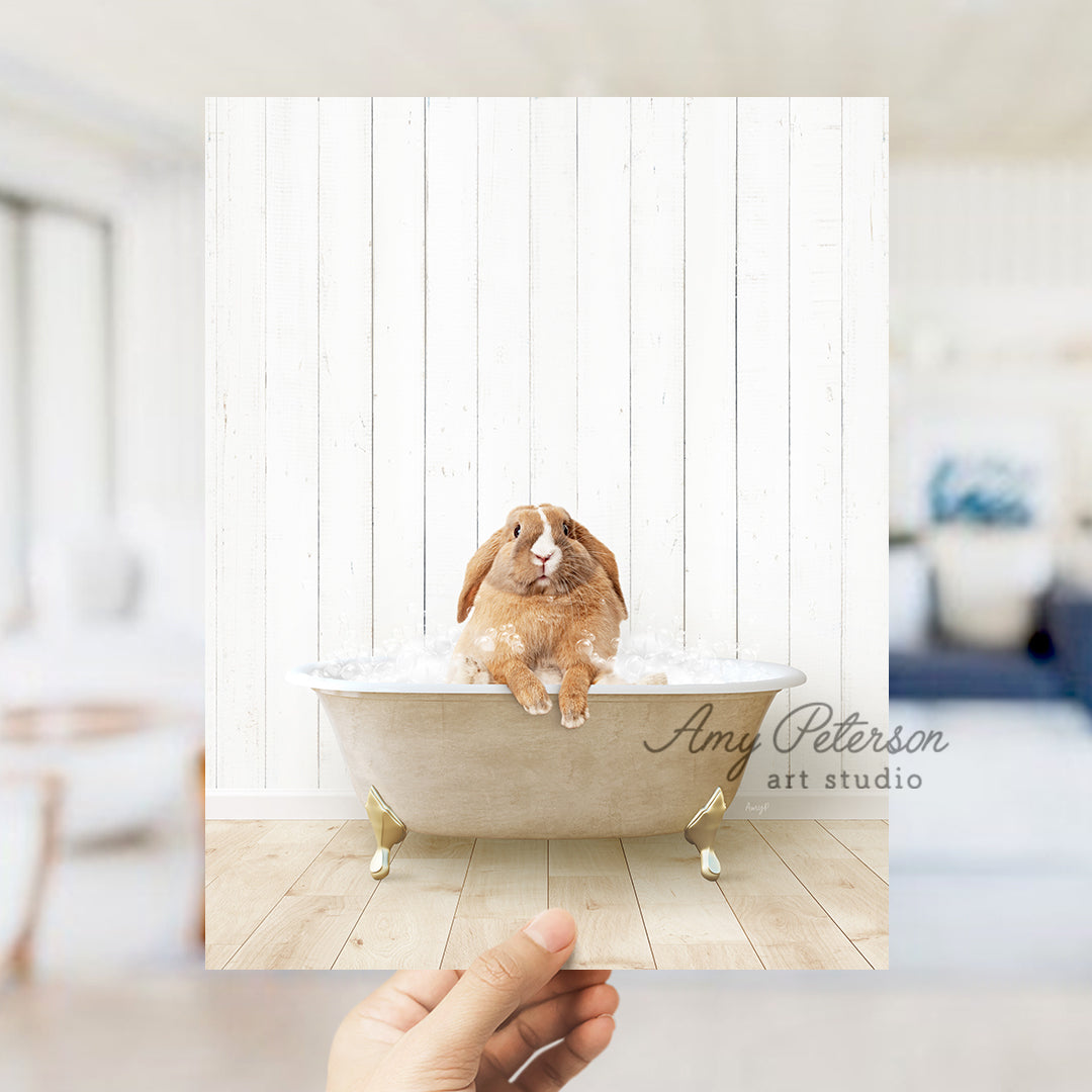 a person holding a photo of a rabbit in a bathtub