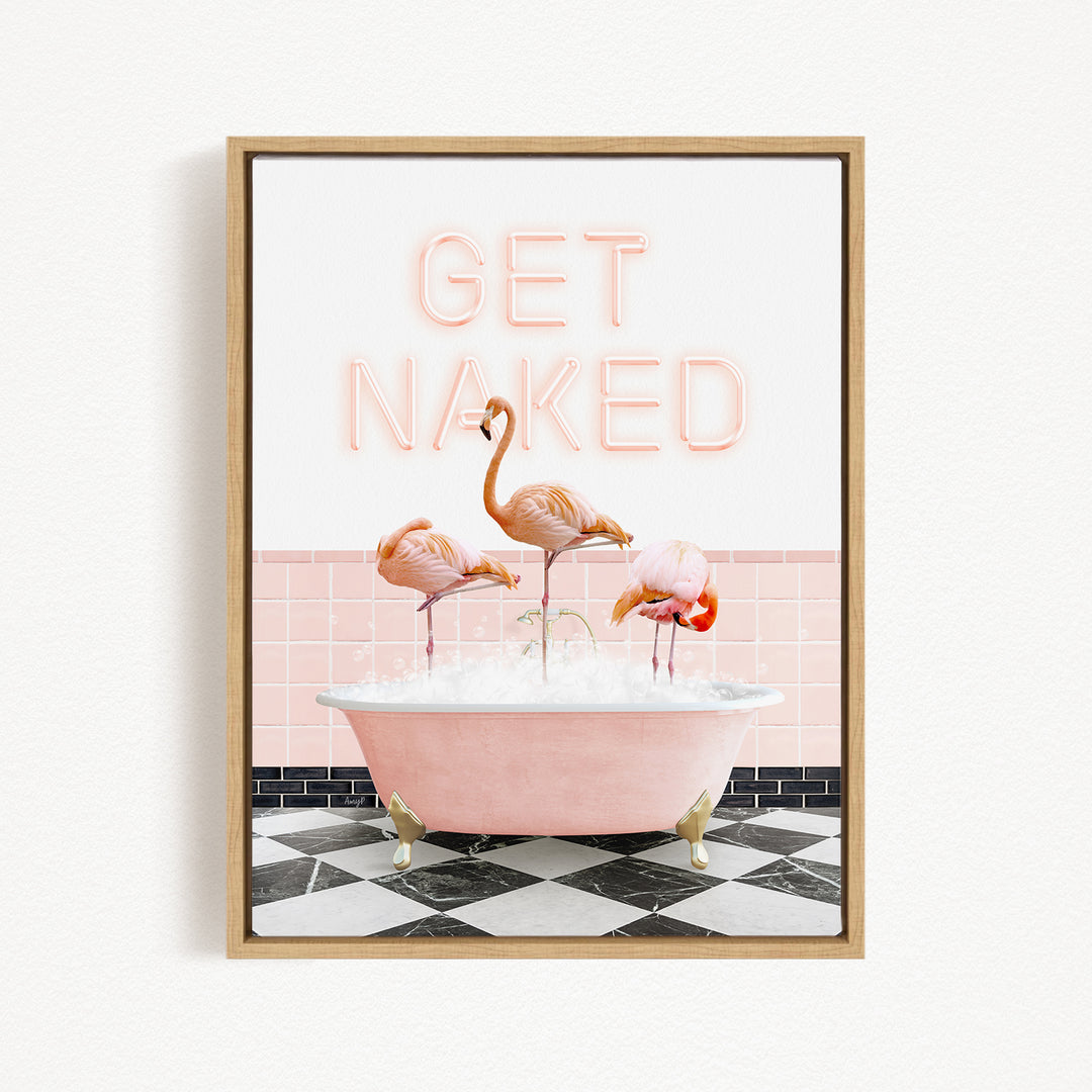 three flamingos standing in a pink bathtub filled with bubbles, with the text "GET NAKED" displayed above them.