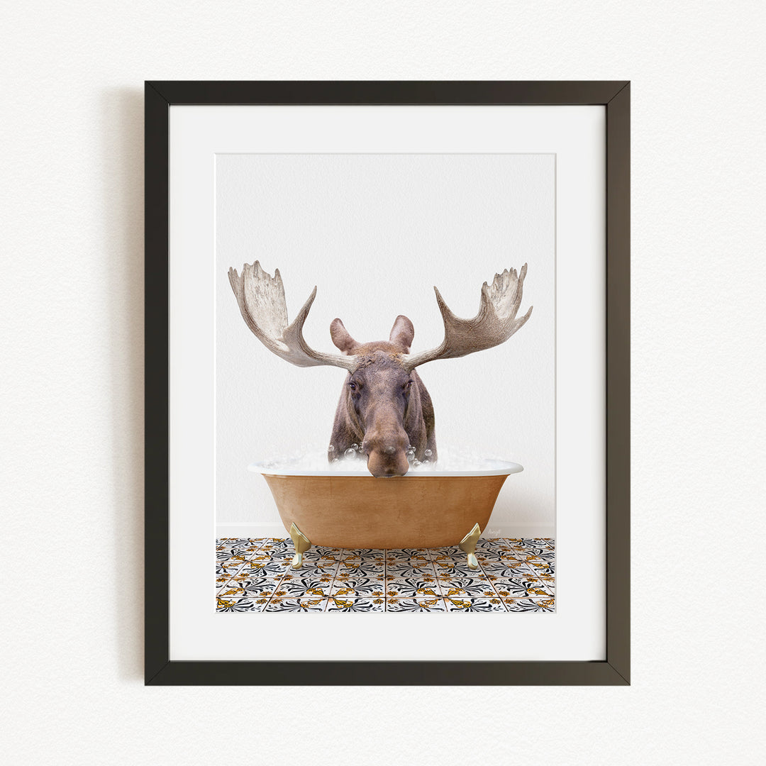 A moose with large antlers is sitting in a bathtub filled with water, surrounded by a patterned tile floor.