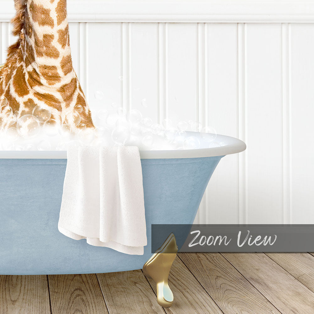 A giraffe standing in a blue bathtub filled with water, with a towel hanging on the side and a "Zoom View" label below the image.