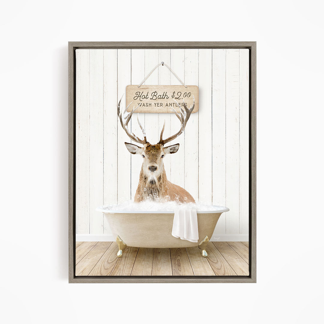 A deer with antlers is sitting in a bathtub, with a sign above it that reads "Hot Bath $2.00 Wash Your Antlers".