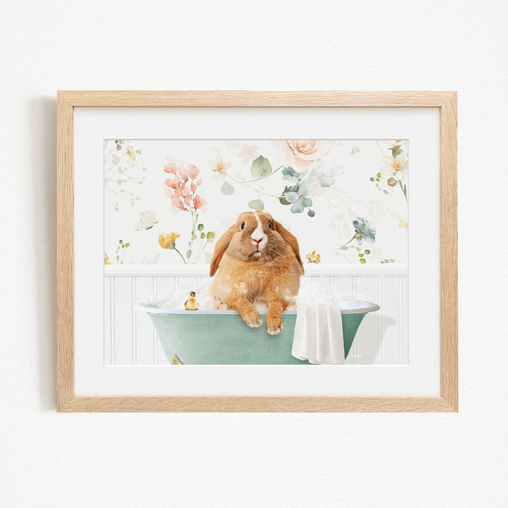 A brown rabbit sitting in a green bathtub filled with water, surrounded by flowers and greenery.