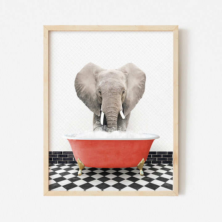 a picture of an elephant taking a bath