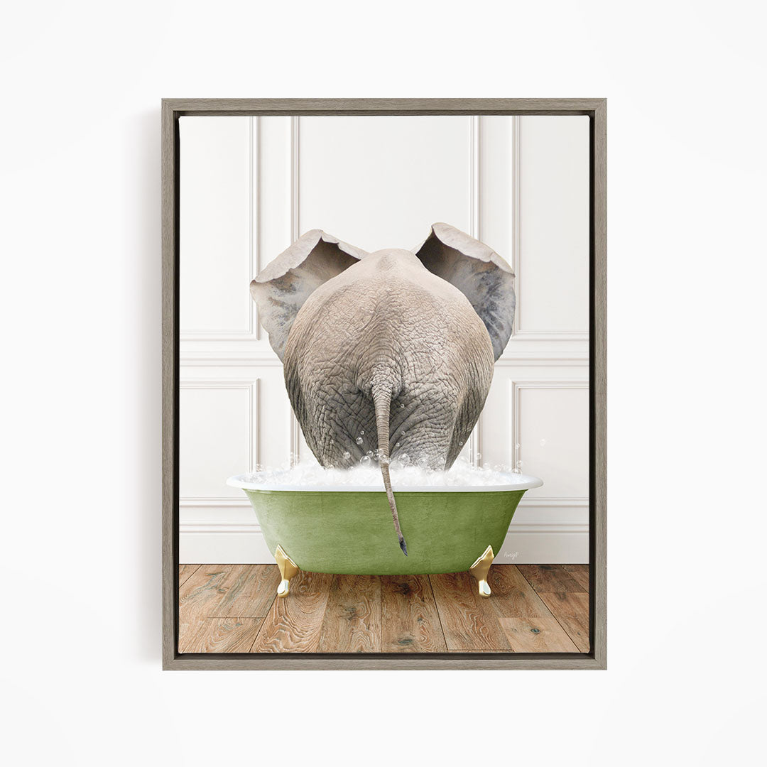 An elephant is standing in a green bathtub filled with water, with its trunk submerged in the water.