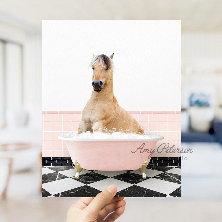 a person holding a card with a horse in a bathtub