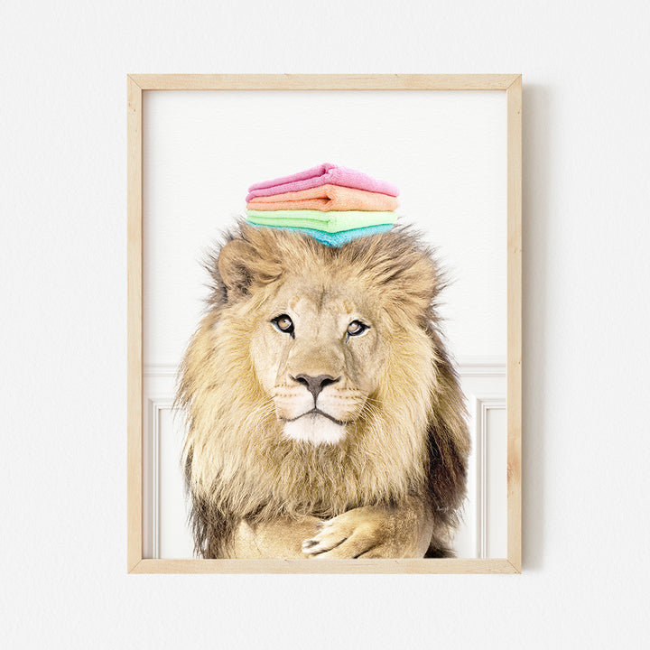 a picture of a lion with a pile of towels on its head