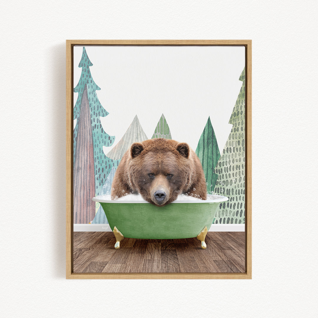 A brown bear is sitting in a green bathtub, surrounded by trees in the background.