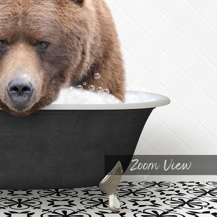 A large brown bear is sitting in a bathtub filled with water, surrounded by bubbles.