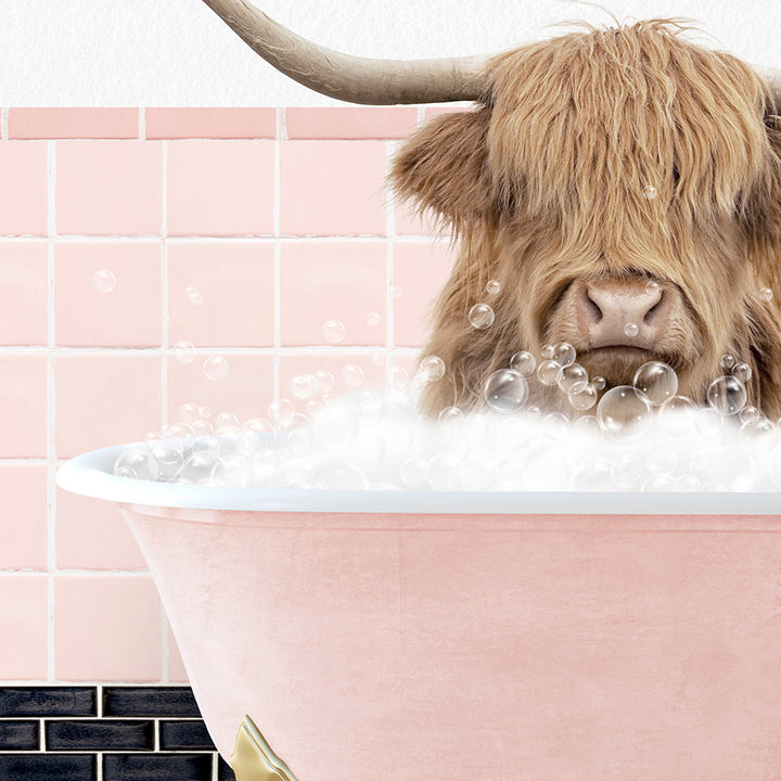 a bull with long horns sitting in a bathtub filled with bubbles