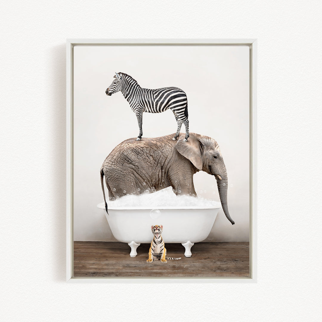 A zebra stands on the back of an elephant, which is submerged in a bathtub, with a small tiger figurine standing in front of the elephant.
