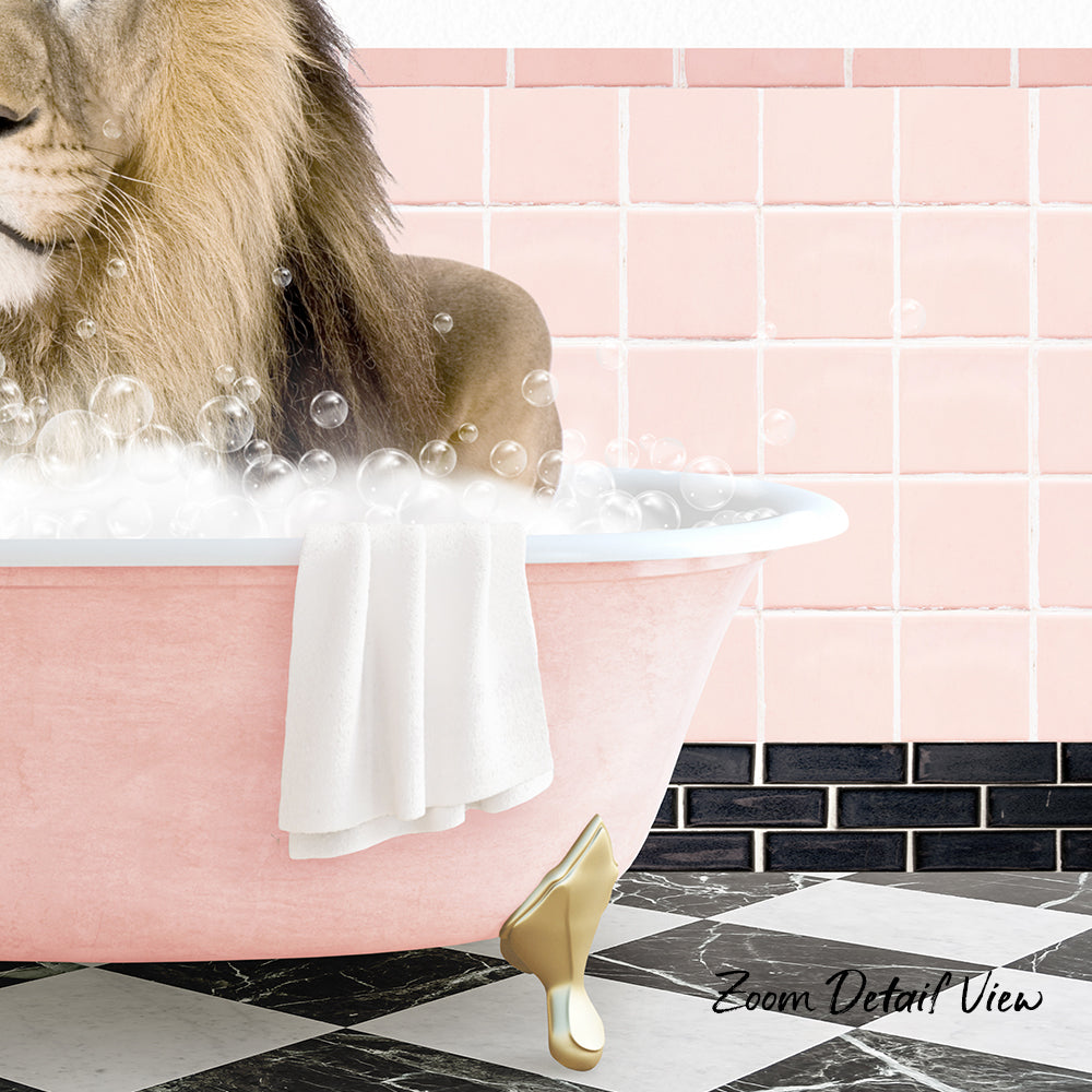 A lion is sitting in a pink bathtub filled with bubbles, with a towel draped over the side and a pink tile wall in the background.