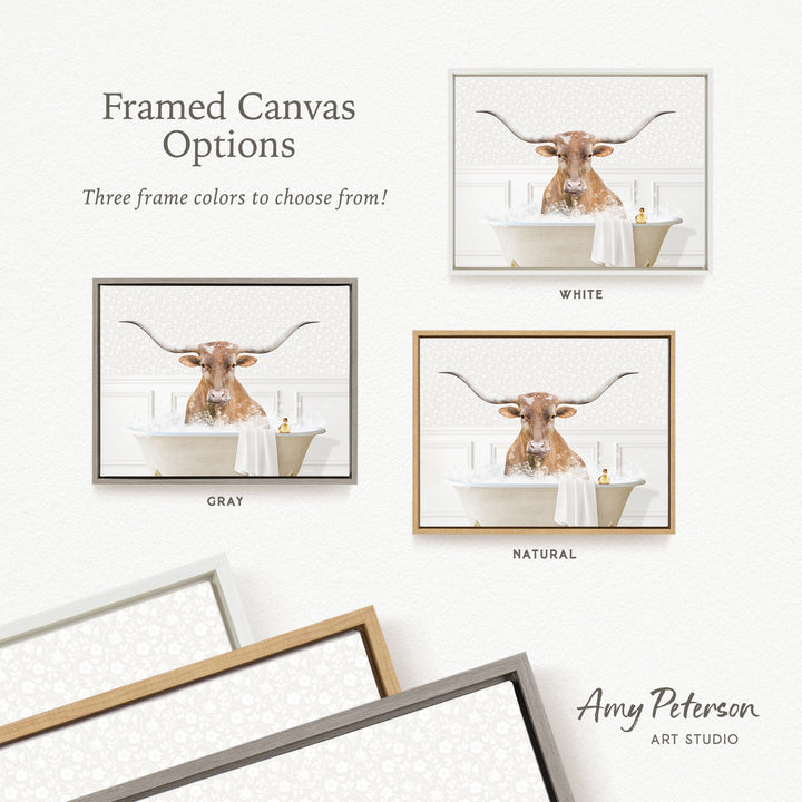 The image is a framed canvas with a picture of a horned animal, likely a cow or a bull, sitting in a bathtub. The canvas has three different frame colors available: white, gray, and natural. The text above the canvas reads " framed Canvas Options" and below the canvas, it says "Three frame colors to choose from!"