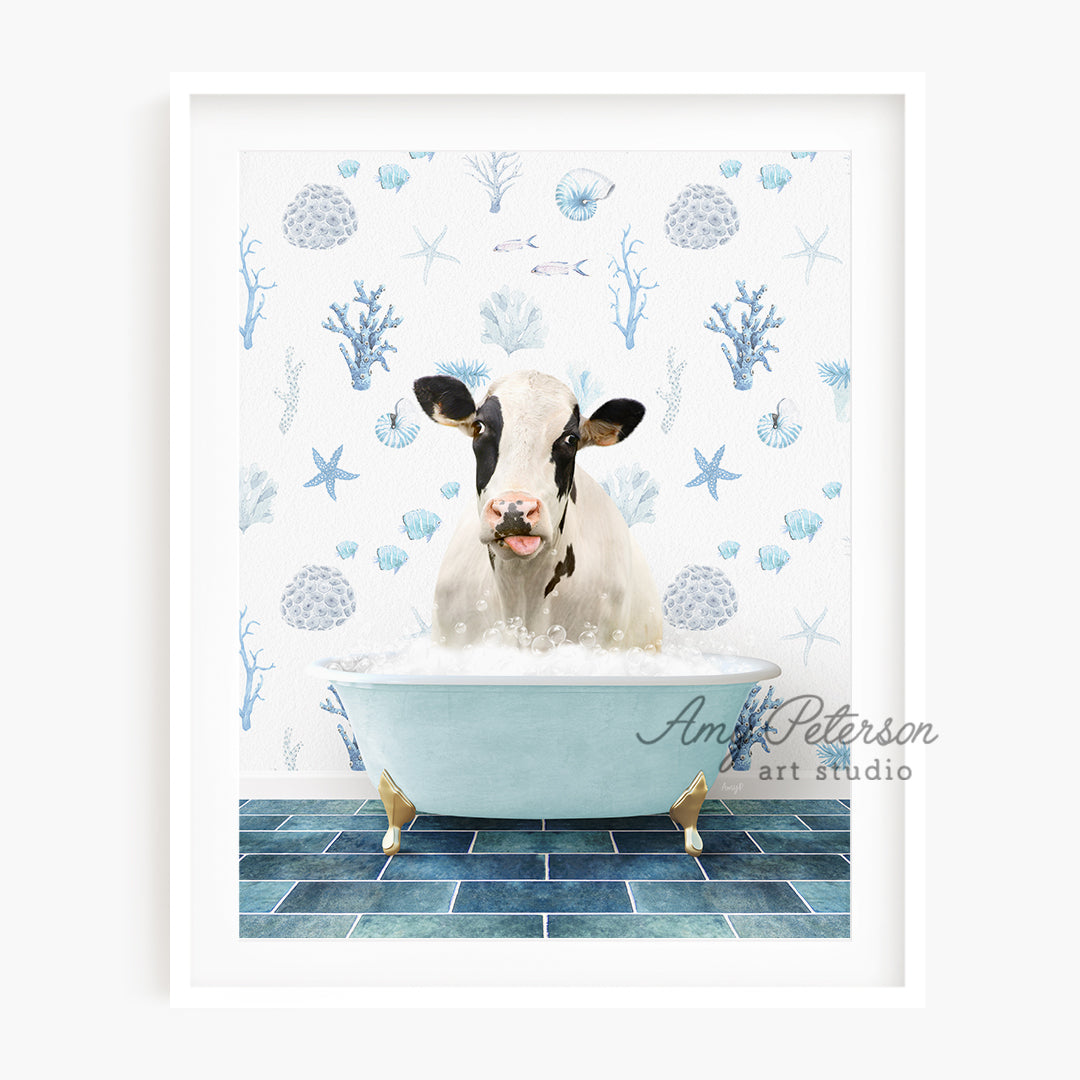 a cow is sitting in a bathtub with a blue tile floor