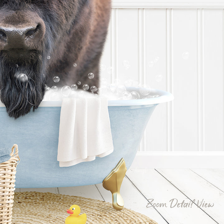 A dog is standing in a blue bathtub filled with bubbles, surrounded by a yellow rubber duck and a white towel.
