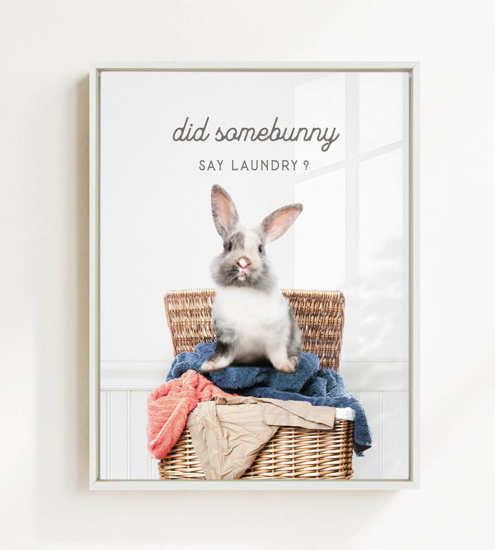 A cute rabbit sitting in a wicker basket filled with laundry, with the text "Did some bunny Say laundry?" displayed above the image.