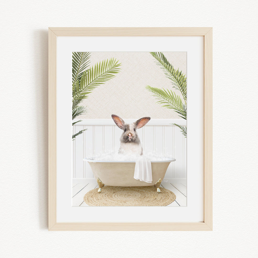 A white rabbit sitting in a bathtub filled with bubbles, surrounded by green palm leaves, creating a whimsical and relaxing scene.