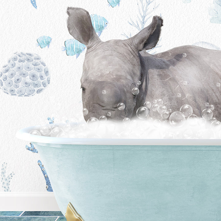 a rhino in a bathtub with bubbles on the rim