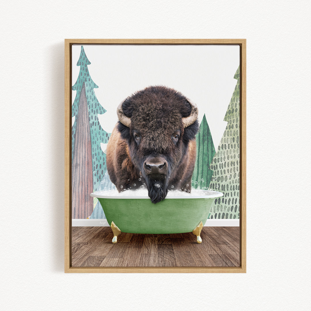 A bison is sitting in a green bathtub, surrounded by trees and a forest-like background.