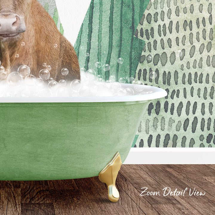 A green bathtub filled with bubbles, with a brown animal, possibly a cow, sitting inside it. The bathtub has gold legs and is placed on a wooden floor.