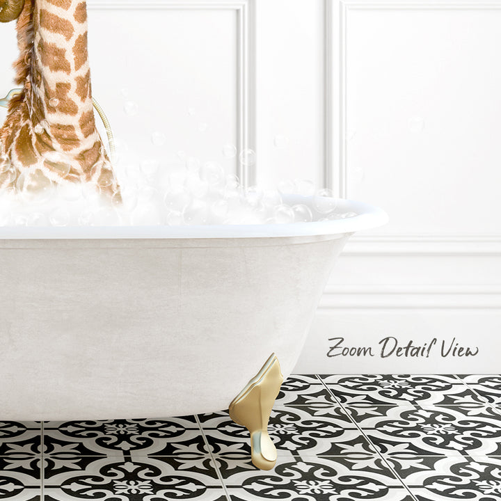 A white claw-foot bathtub filled with bubbles, with a giraffe standing on the edge of the tub.