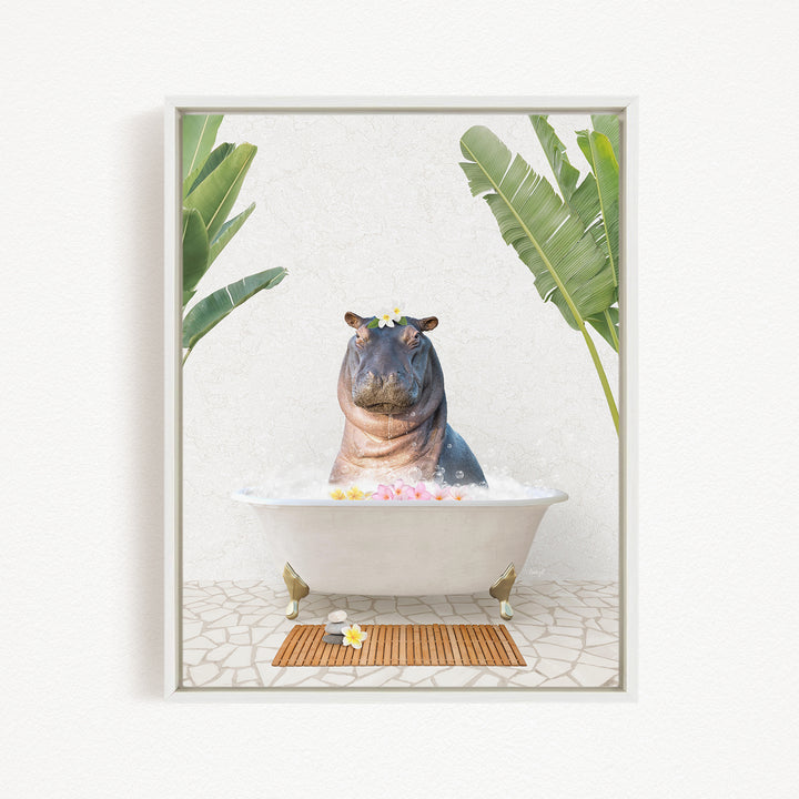 A hippopotamus sitting in a bathtub filled with bubbles, surrounded by tropical plants and a wooden mat.