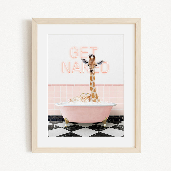 A giraffe standing in a pink bathtub with a pink and white tiled wall behind it, and a pink neon sign that says "GET NAKED" in the background.