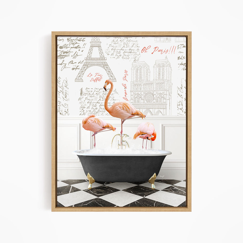 A framed image depicting three pink flamingos standing in a bathtub, with a Paris-themed background featuring the Eiffel Tower and other Parisian landmarks.