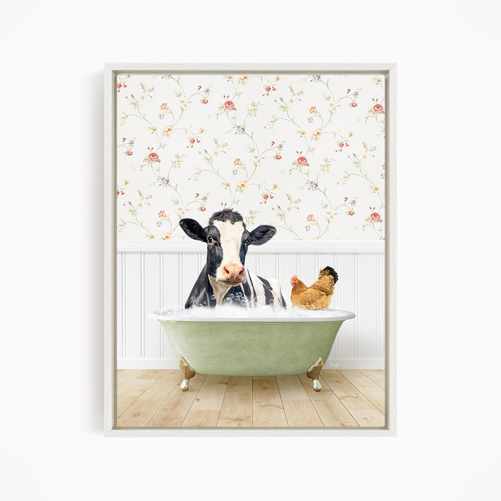 A black and white cow is sitting in a green bathtub, with a chicken standing nearby, against a floral wallpaper background.