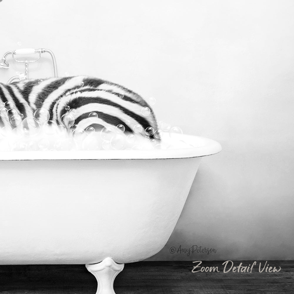 A zebra lying in a white bathtub filled with bubbles, creating a whimsical and playful scene.