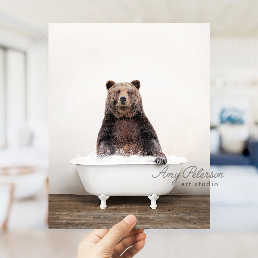 a bear sitting in a bathtub in a room