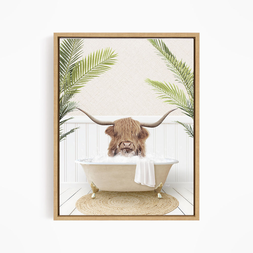 A brown cow with long horns is sitting in a bathtub filled with water, surrounded by green palm leaves.
