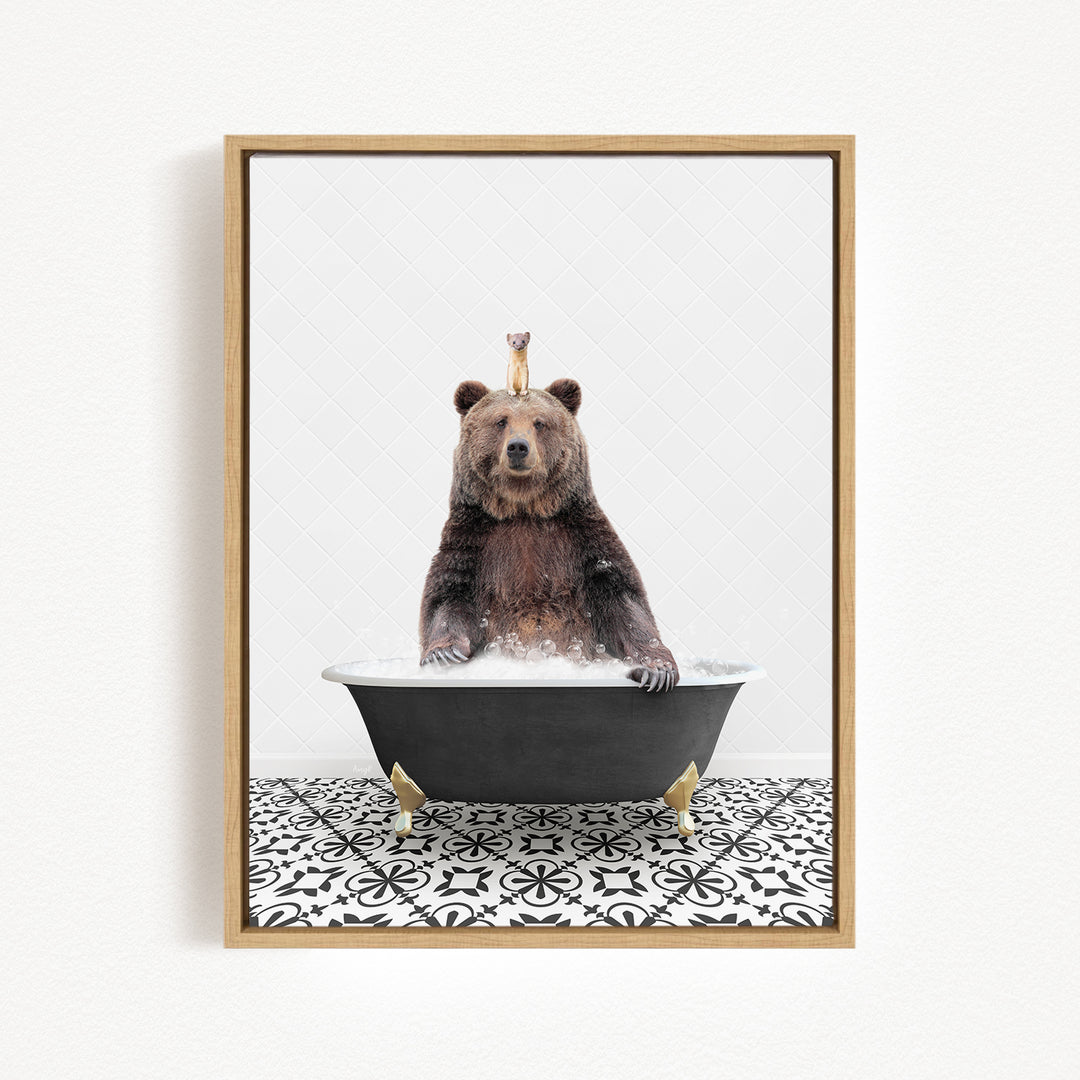 A brown bear sitting in a bathtub filled with water, with a small bird perched on its head.