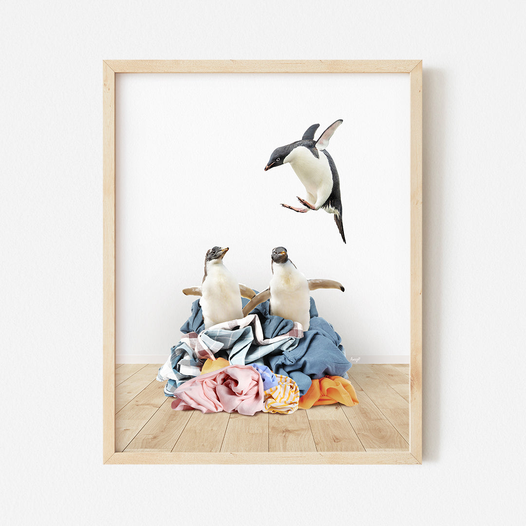 a picture of three birds flying over a pile of clothes