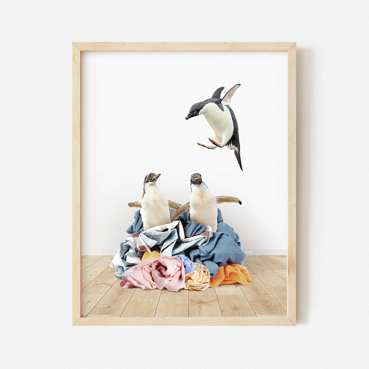 a picture of three birds flying over a pile of clothes